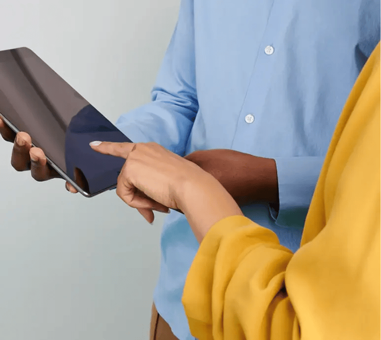 img-people-pointing-at-tablet